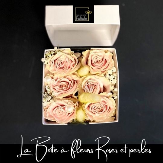 Boîte à fleurs roses